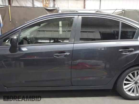 2014 Subaru Impreza Premium with VIN JF1GJAD65EH005774, listed as a IAAI auction lot 42282759 with 134,632 mi miles and . Bid and sale history available at DreamBid. Image 14.