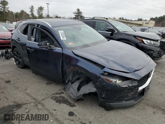 2022 Mazda CX-30 2.5 Turbo with VIN 3MVDMBAY5NM447836, listed as a Copart auction lot 87030384 with 38,008 mi miles and Salvage Title. Bid and sale history available at DreamBid. Image 4.