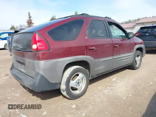 2001 Pontiac Aztek GT z VIN 3G7DA03E51S531919, wystawiony jako IAAI lot #41858636 z przebiegiem 142 539 mil mil oraz . Historia ofert i sprzedaży dostępna na DreamBid. Obrazek 4.