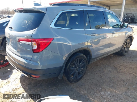 2022 Honda Pilot Special Edition with VIN 5FNYF5H20NB023310, listed as a IAAI auction lot 41398366 with 53,610 mi miles and . Bid and sale history available at carsss.com. Image 4.