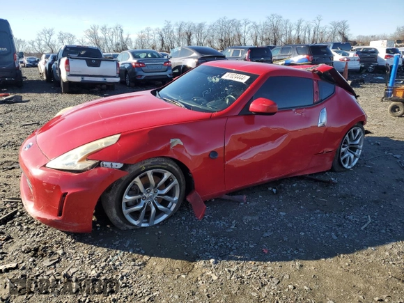2014 Nissan 370Z Nismo with VIN JN1AZ4EH7EM630228, listed as a Copart auction lot 87024444 with 88,456 mi miles and Salvage title. Bid and sale history available at DreamBid. Image 1.
