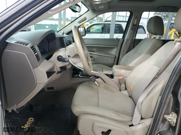 2006 Jeep Grand Cherokee Laredo with VIN 1J4HR48N56C112780, listed as a Copart auction lot 49652685 with 236,428 mi miles and Salvage Title. Bid and sale history available at carsss.com. Image 7.