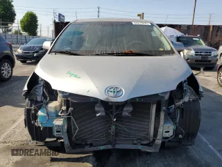 2011 Toyota Sienna LE AAS with VIN 5TDKK3DC6BS054847, listed as a Copart auction lot 64673975 with 197,266 mi miles and Salvage title. Bid and sale history available at DreamBid. Image 5.