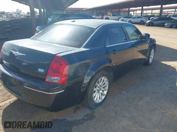 2007 Chrysler 300 Touring with VIN 2C3KA53G97H792641, listed as a IAAI auction lot 42071649 with 144,258 mi miles. Bid and sale history available at carsss.com. Image 4.