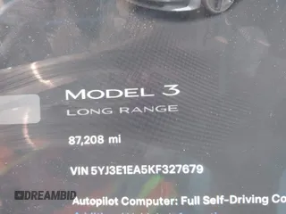 2019 Tesla Model 3 Mid Range with VIN 5YJ3E1EA5KF327679, listed as a IAAI auction lot 41804379 with 87,208 mi miles and . Bid and sale history available at DreamBid. Image 7.