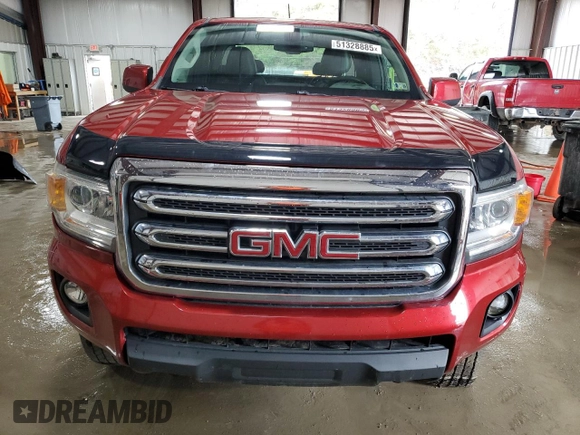 2015 GMC Canyon 4WD SLE with VIN 1GTH6BE39F1203164, listed as a Copart auction lot 51328885 with 107,171 mi miles and Salvage Title. Bid and sale history available at carsss.com. Image 5.