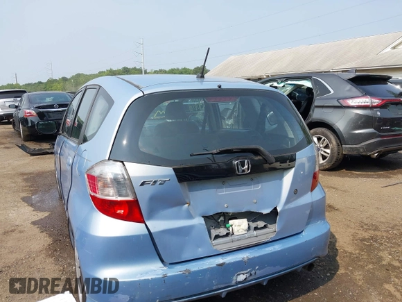 2009 Honda Fit with VIN JHMGE88209S052443, listed as a IAAI auction lot 42406572 with 140,343 mi miles and . Bid and sale history available at DreamBid. Image 6.
