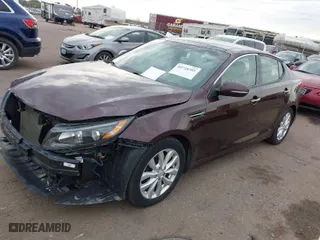 2015 Kia Optima EX with VIN 5XXGN4A72FG462764, listed as a IAAI auction lot 40728305 with 97,127 mi miles. Bid and sale history available at carsss.com. Image 2.