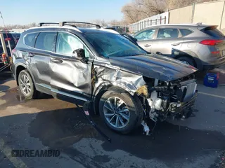 2020 Hyundai Santa Fe Limited with VIN 5NMS5CAD9LH273715, listed as a IAAI auction lot 41259190 with 14,669 mi miles and . Bid and sale history available at DreamBid. Image 1.
