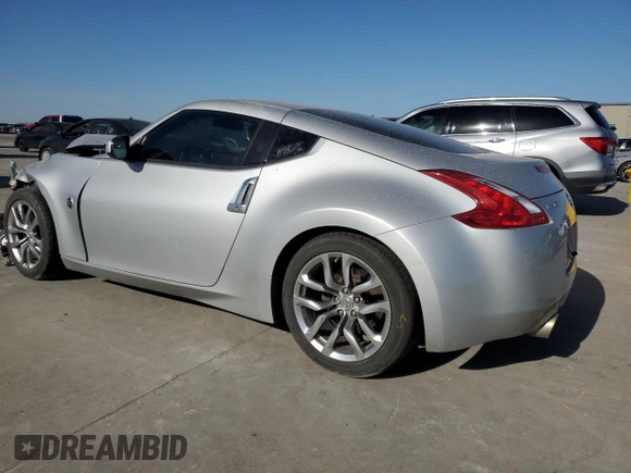 2013 Nissan 370Z with VIN JN1AZ4EH2DM880023, listed as a Copart auction lot 49601885 with 79,196 mi miles and Salvage Title. Bid and sale history available at carsss.com. Image 2.