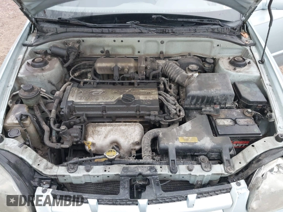 2003 Hyundai Accent GL z VIN KMHCG45C43U465523, wystawiony jako IAAI lot #40883056 z przebiegiem 95 770 mil mil oraz . Historia ofert i sprzedaży dostępna na DreamBid. Obrazek 10.