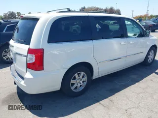 2012 Chrysler Town & Country Touring with VIN 2C4RC1BG5CR291815, listed as a IAAI auction lot 42147129 with 167,982 mi miles and . Bid and sale history available at DreamBid. Image 4.