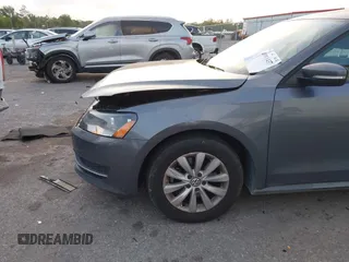 2013 Volkswagen Passat Wolfsburg Edition z VIN 1VWAP7A36DC114152, wystawiony jako IAAI lot #41911437 z przebiegiem 163 048 mil mil oraz . Historia ofert i sprzedaży dostępna na DreamBid. Obrazek 6.