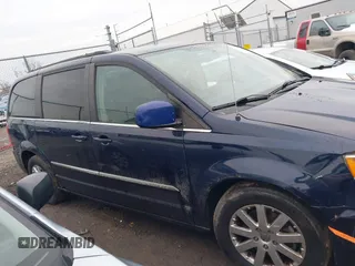 2013 Chrysler Town & Country Touring with VIN 2C4RC1BG9DR670205, listed as a IAAI auction lot 41683764 with 173,145 mi miles. Bid and sale history available at carsss.com. Image 13.