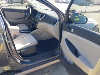 2017 Hyundai Tucson SE Plus with VIN KM8J33A45HU420349, listed as a IAAI auction lot 41296190 with 77,910 mi miles. Bid and sale history available at carsss.com. Image 5.
