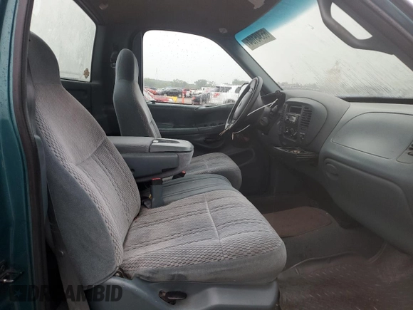 1998 Ford F-150 with VIN 1FTZF18W8WKA89592, listed as a Copart auction lot 65345104 with 166,758 mi miles and Salvage title. Bid and sale history available at DreamBid. Image 11.