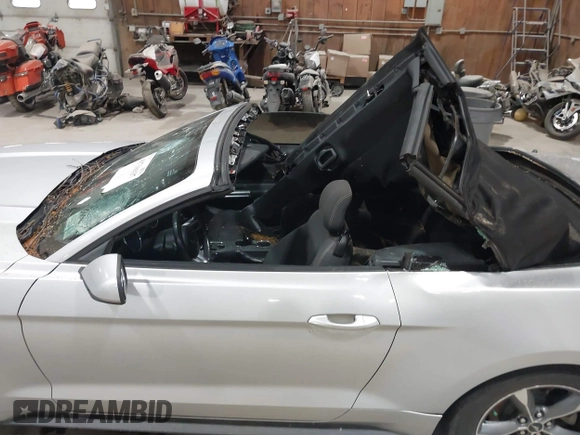 2016 Ford Mustang V6 z VIN 1FATP8EM2G5216177, wystawiony jako IAAI lot #41716137 z przebiegiem 73 332 mil mil oraz . Historia ofert i sprzedaży dostępna na DreamBid. Obrazek 18.