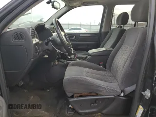 2006 GMC Envoy SLT with VIN 1GKDS13S762343520, listed as a Copart auction lot 82714134 with 0 mi miles and Clean Title. Bid and sale history available at carsss.com. Image 7.
