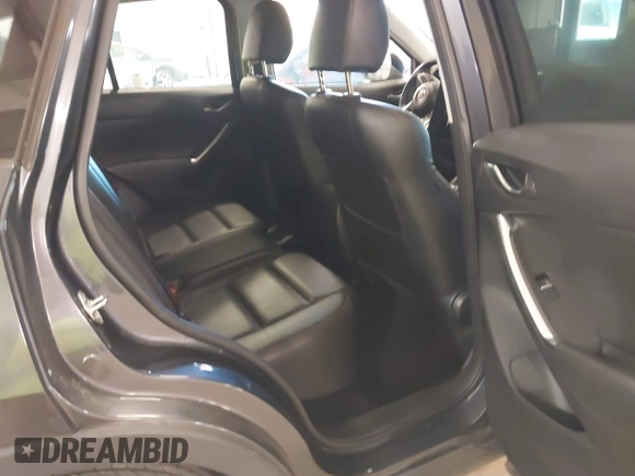 2016 Mazda CX-5 Grand Touring with VIN JM3KE2DYXG0846787, listed as a IAAI auction lot 41346364 with 113,553 mi miles. Bid and sale history available at carsss.com. Image 8.
