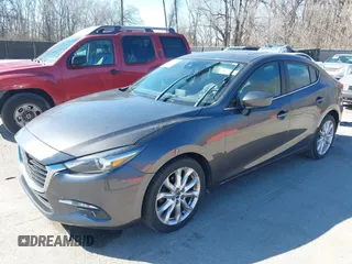 2017 Mazda 3 Grand Touring z VIN 3MZBN1W39HM137879, wystawiony jako IAAI lot #41857308 z przebiegiem 73 569 mil mil oraz . Historia ofert i sprzedaży dostępna na DreamBid. Obrazek 17.