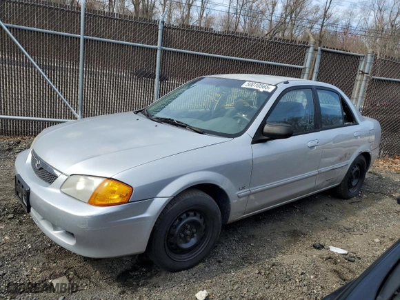 2000 Mazda Protege DX with VIN JM1BJ222XY0199683, listed as a Copart auction lot 50010565 with 139,428 mi miles and Salvage Title. Bid and sale history available at carsss.com. Image 1.