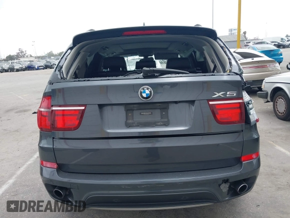 2013 BMW X5 xDrive35i z VIN 5UXZV4C57D0E04976, wystawiony jako IAAI lot #42111435 z przebiegiem 160 226 mil mil oraz . Historia ofert i sprzedaży dostępna na DreamBid. Obrazek 15.