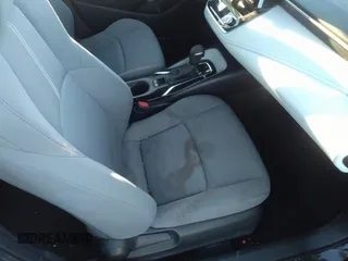 2021 Toyota Corolla SE with VIN 5YFS4MCE9MP090031, listed as a IAAI auction lot 41335232 with 57,128 mi miles. Bid and sale history available at carsss.com. Image 5.
