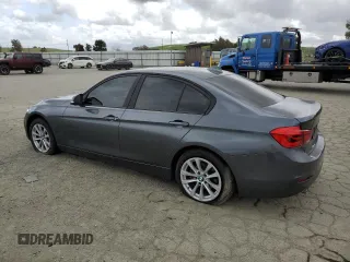 2018 BMW 3 Series 320i with VIN WBA8E1G59JNU88913, listed as a Copart auction lot 50989025 with Not Provided miles and Salvage Title. Bid and sale history available at carsss.com. Image 2.