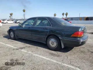 1996 Acura RL with VIN JH4KA965XTC009917, listed as a Copart auction lot 65083665 with 197,486 mi miles and Salvage title. Bid and sale history available at DreamBid. Image 2.
