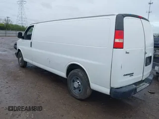 2014 Chevrolet Express Cargo Van with VIN 1GCWGGCA0E1155572, listed as a IAAI auction lot 41965353 with 324,538 mi miles. Bid and sale history available at carsss.com. Image 3.