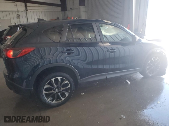 2016 Mazda CX-5 Grand Touring with VIN JM3KE4DY7G0735576, listed as a Copart auction lot 41916395 with 0 mi miles and Non Repairable. Bid and sale history available at carsss.com. Image 3.