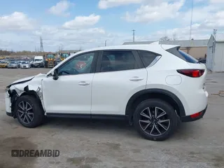 2018 Mazda CX-5 Touring with VIN JM3KFBCMXJ0353369, listed as a IAAI auction lot 41902554 with 154,104 mi miles and . Bid and sale history available at DreamBid. Image 15.