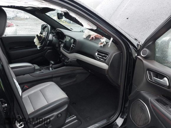 2023 Dodge Durango Citadel with VIN 1C4RDJEG1PC582304, listed as a IAAI auction lot 42528327 with 9,896 mi miles and . Bid and sale history available at DreamBid. Image 5.