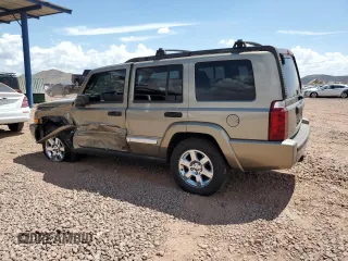 2006 Jeep Commander with VIN 1J8HH48K46C203109, listed as a Copart auction lot 65867435 with 191,804 mi miles and Salvage title. Bid and sale history available at DreamBid. Image 2.