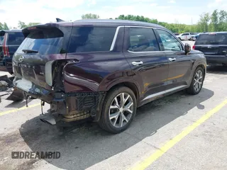 2021 Hyundai Palisade Limited with VIN KM8R5DHE0MU263048, listed as a IAAI auction lot 42365566 with 90,102 mi miles and . Bid and sale history available at DreamBid. Image 4.