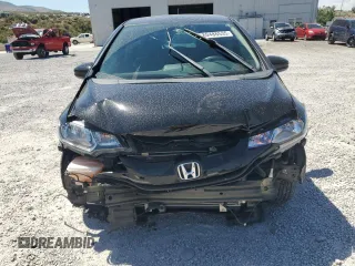 2015 Honda Fit LX z VIN 3HGGK5H52FM759746, wystawiony jako Copart lot #60486535 z przebiegiem 64 295 mil mil oraz Szkoda całkowita • Salvage title. Historia ofert i sprzedaży dostępna na DreamBid. Obrazek 5.