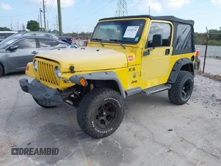 2002 Jeep Wrangler X z VIN 1J4FA39S82P719241, wystawiony jako IAAI lot #42150742 z przebiegiem 147 914 mil mil oraz . Historia ofert i sprzedaży dostępna na DreamBid. Obrazek 17.
