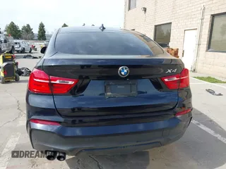 2015 BMW X4 xDrive35i with VIN 5UXXW5C50F0E87728, listed as a IAAI auction lot 41819628 with 136,042 mi miles and . Bid and sale history available at DreamBid. Image 17.