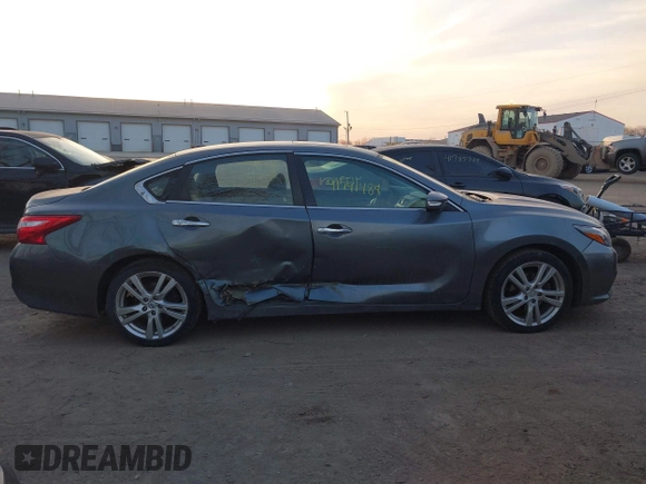 2017 Nissan Altima SL with VIN 1N4BL3AP4HC180533, listed as a IAAI auction lot 41791484 with 120,619 mi miles and . Bid and sale history available at DreamBid. Image 14.