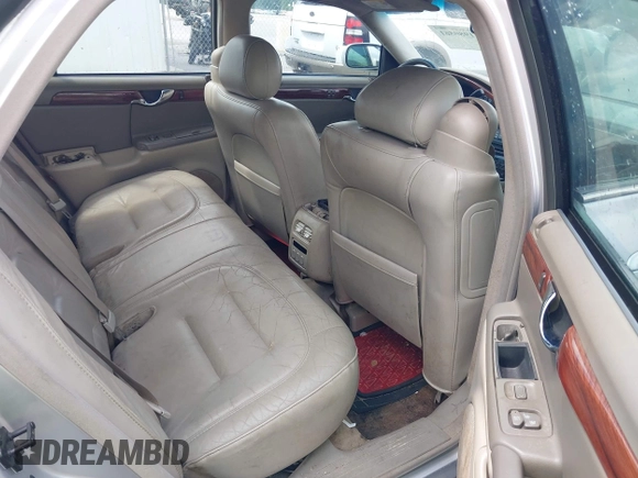 2003 Cadillac DeVille with VIN 1G6KD54Y63U115955, listed as a IAAI auction lot 41980561 with 176,624 mi miles. Bid and sale history available at carsss.com. Image 8.