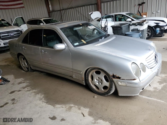 2000 Mercedes-Benz E-Class with VIN WDBJF70J7YB142395, listed as a Copart auction lot 53849225 with 138,289 mi miles and Clean Title. Bid and sale history available at carsss.com. Image 4.