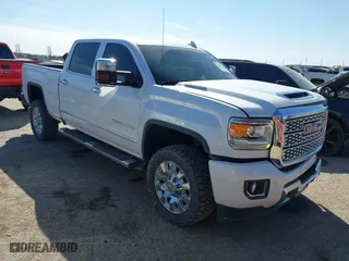 2019 GMC Sierra 2500HD Denali with VIN 1GT12SEY8KF139611, listed as a IAAI auction lot 41641028 with 69,776 mi miles. Bid and sale history available at carsss.com. Image 1.