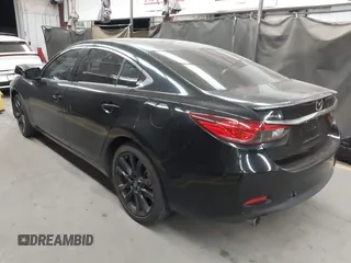 2014 Mazda Mazda6 i Touring with VIN JM1GJ1T67E1125290, listed as a IAAI auction lot 42041112 with 114,875 mi miles. Bid and sale history available at carsss.com. Image 3.