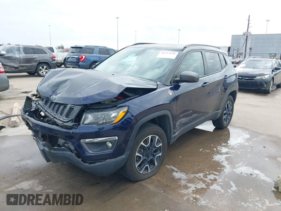 2019 Jeep Compass Trailhawk with VIN 3C4NJDDB8KT619330, listed as a IAAI auction lot 41237920 with 85,144 mi miles and . Bid and sale history available at DreamBid. Image 17.