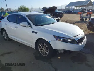 2013 Kia Optima LX with VIN KNAGM4A72D5362553, listed as a IAAI auction lot 42004593 with 127,918 mi miles. Bid and sale history available at carsss.com. Image 1.