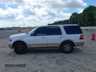 2013 Ford Expedition XLT with VIN 1FMJU1H51DEF14975, listed as a IAAI auction lot 42780599 with 195,174 mi miles and . Bid and sale history available at DreamBid. Image 14.