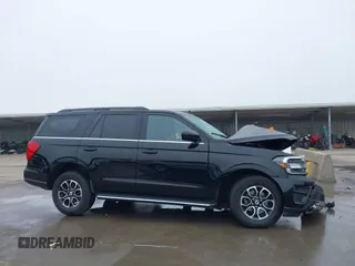 2023 Ford Expedition XLT with VIN 1FMJU1H86PEA14891, listed as a IAAI auction lot 41514898 with 56,592 mi miles. Bid and sale history available at carsss.com. Image 14.