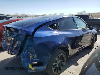2023 Tesla Model Y Long Range with VIN 7SAYGAEE6PF689615, listed as a Copart auction lot 50999385 with 16,514 mi miles and Salvage Title. Bid and sale history available at DreamBid. Image 3.