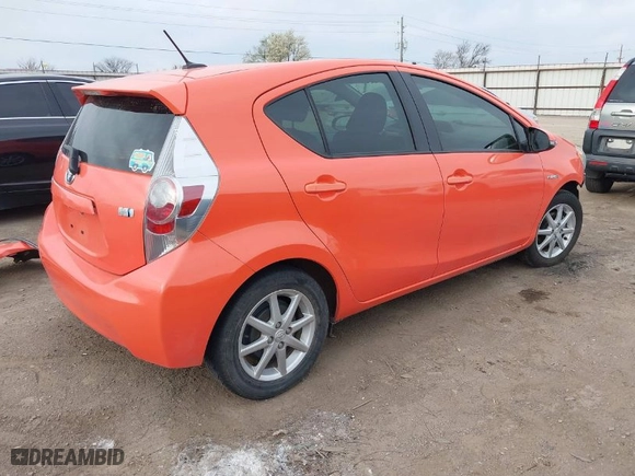 2013 Toyota Prius c One with VIN JTDKDTB35D1051791, listed as a IAAI auction lot 41801509 with 69,870 mi miles. Bid and sale history available at carsss.com. Image 4.