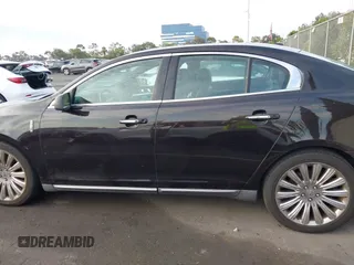 2013 Lincoln MKS with VIN 1LNHL9DK6DG608673, listed as a IAAI auction lot 42756289 with 103,118 mi miles and . Bid and sale history available at DreamBid. Image 14.